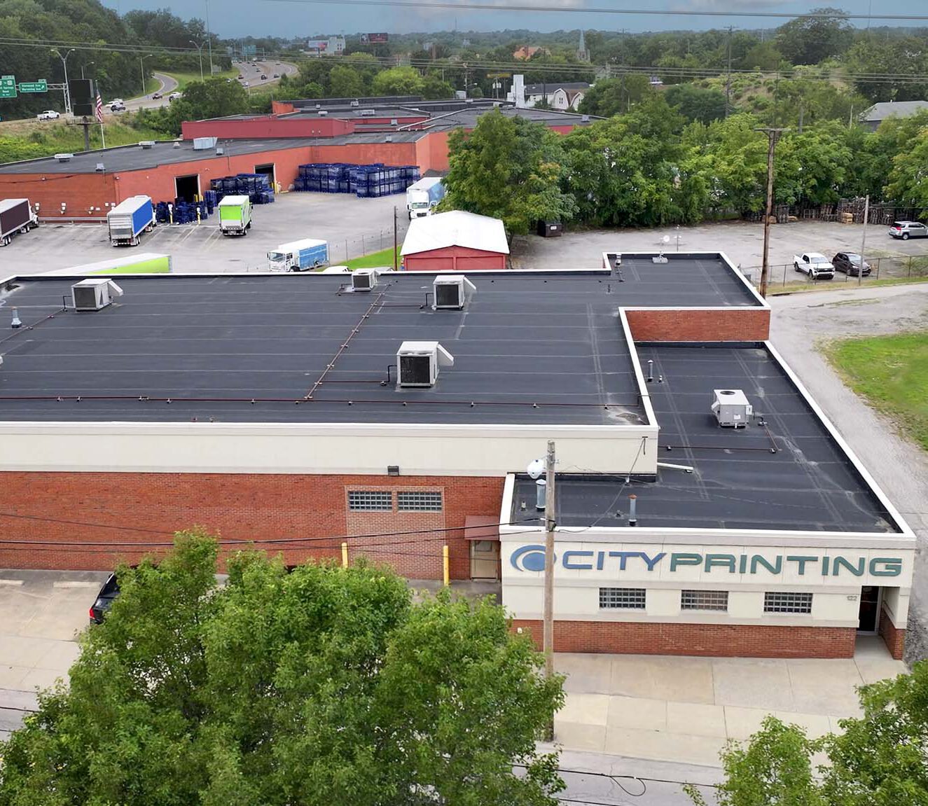 City Printing, Inc. 122 Oak Hill Ave., Youngstown, OH exterior with Interstate 680 in the background